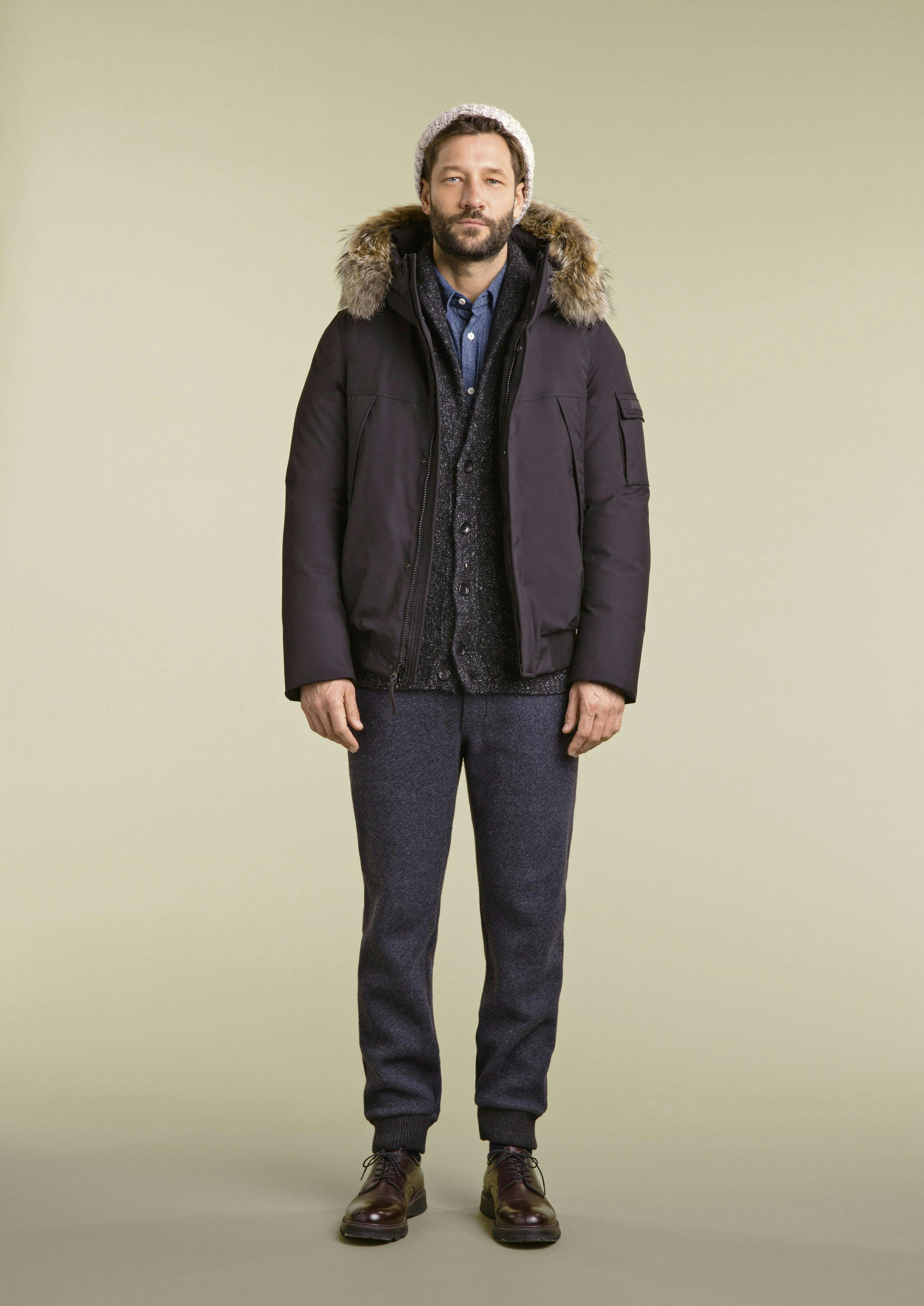clothing apparel coat overcoat person human jacket