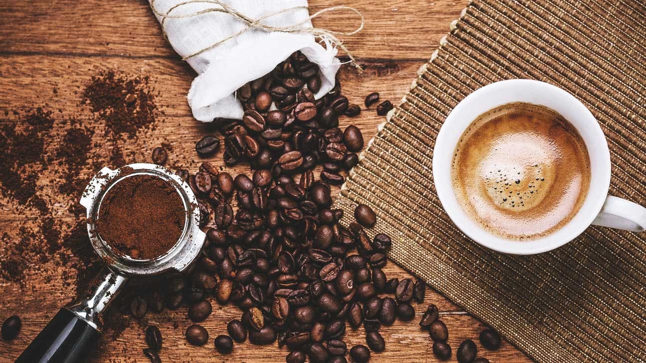 coffee cup cup wristwatch plant espresso drink beverage latte