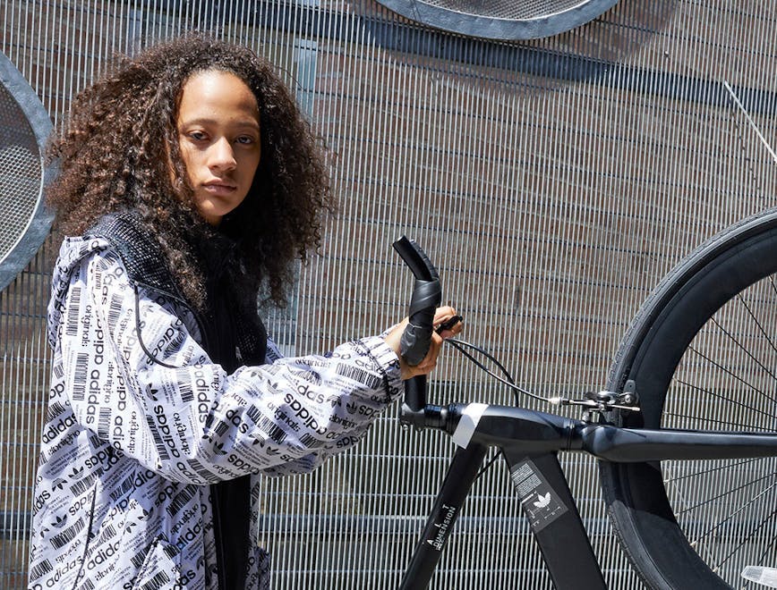 machine wheel person human bike transportation bicycle vehicle apparel clothing