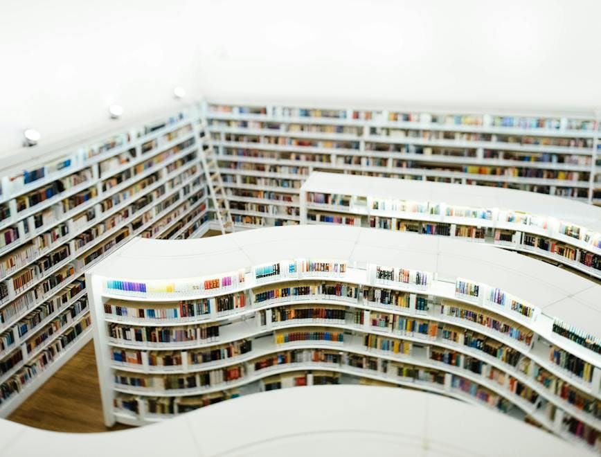 indoors library room book shelf