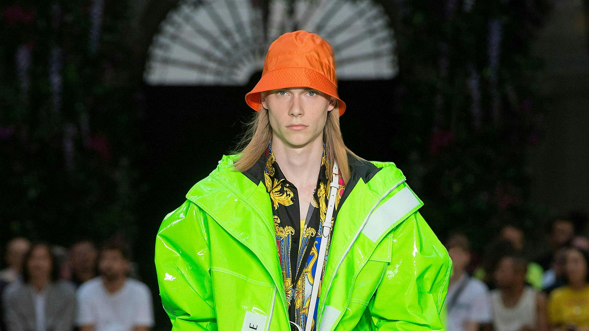 apparel clothing person human coat raincoat jacket