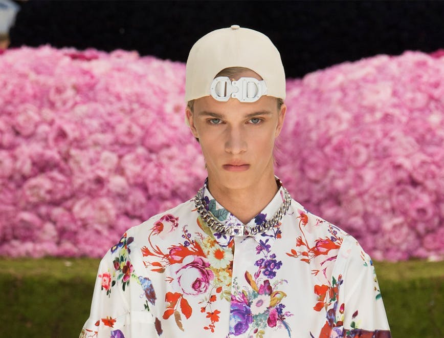 apparel clothing person human plant flower blossom