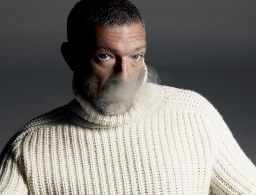 face person human apparel clothing sweater beard