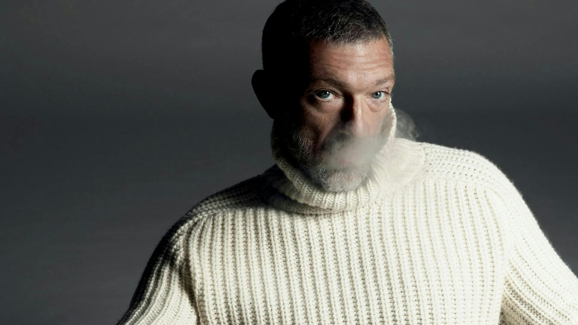 person face human clothing apparel sweater beard
