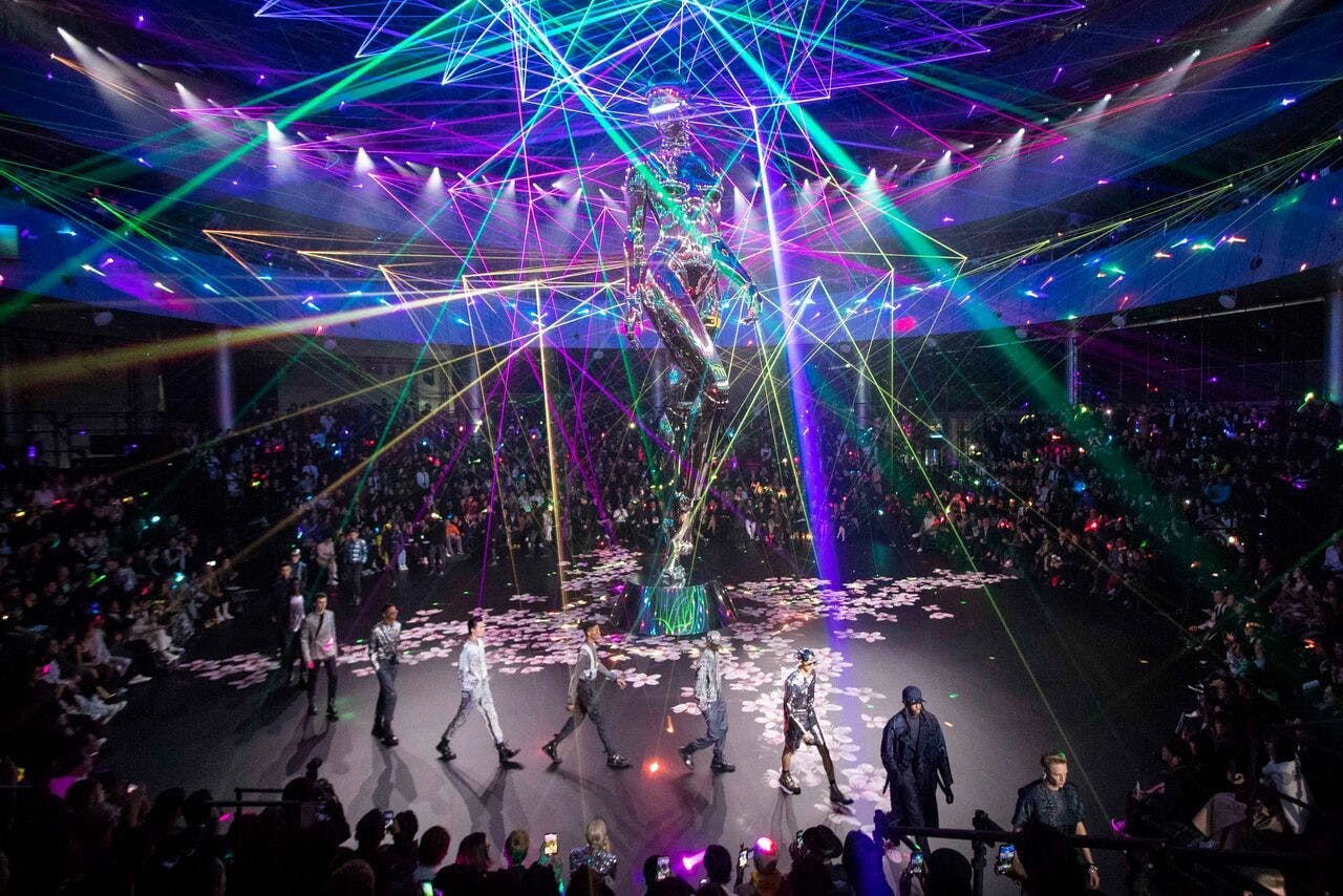 person human lighting light laser club stage