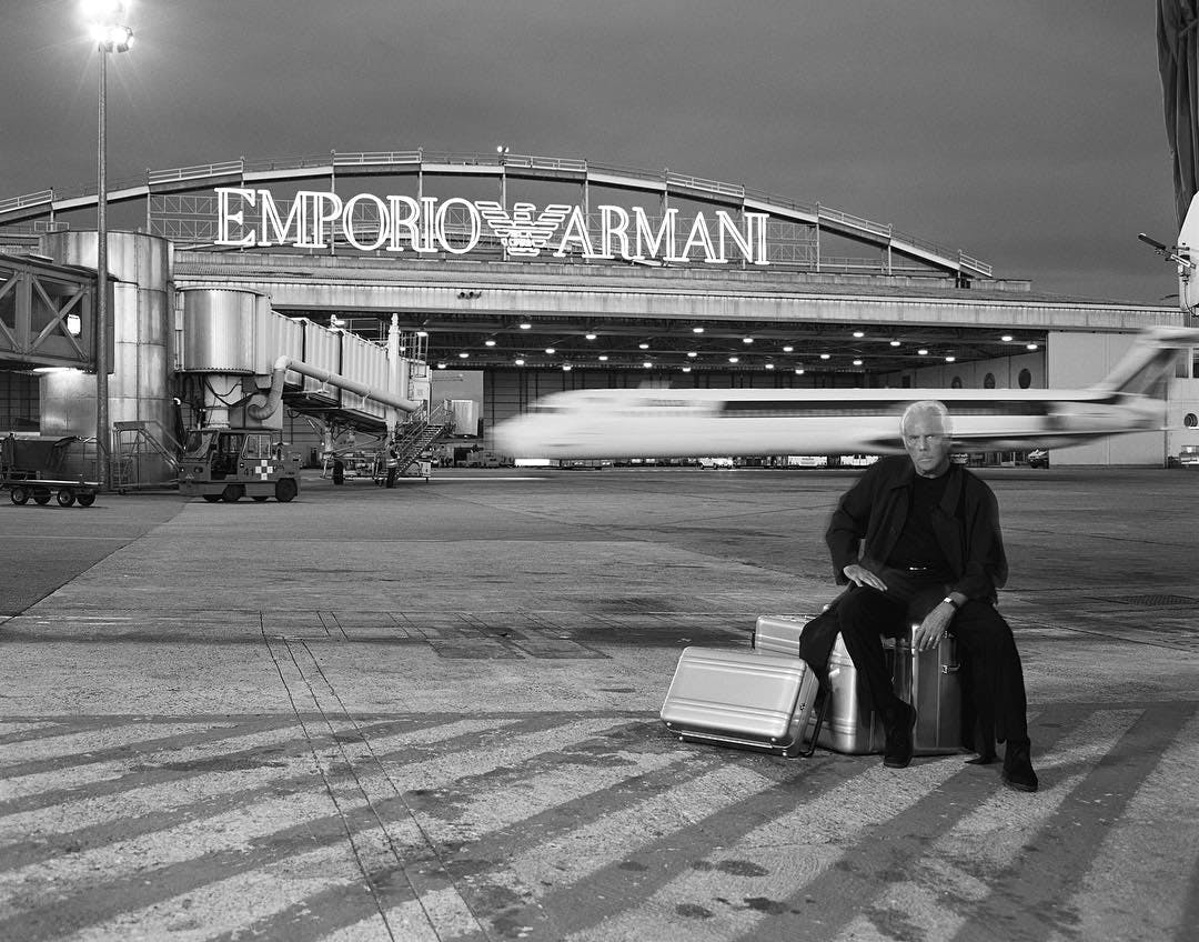 human person hangar building airport vehicle transportation aircraft airplane airfield
