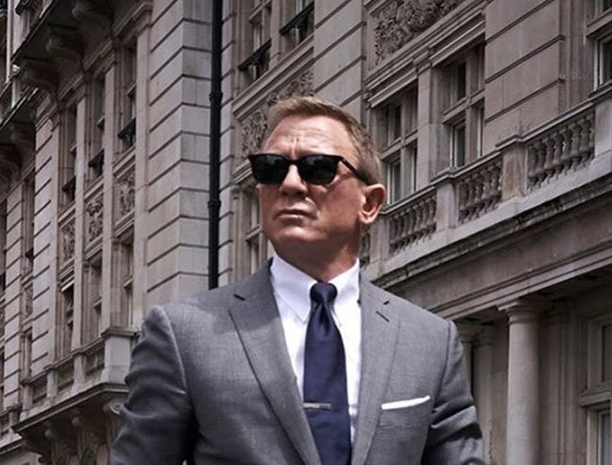 accessories tie clothing apparel person coat suit overcoat sunglasses man