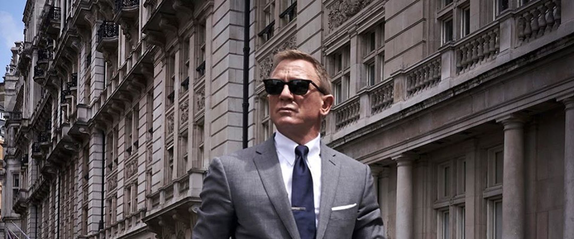 accessories tie clothing apparel person coat overcoat suit sunglasses man