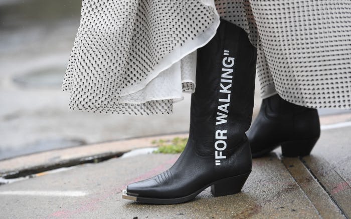 street style spring summer 2019 new york fashion week usa 10 sep 2018 nyfw ss19 alone female not-personality 74422054 clothing apparel footwear boot riding boot