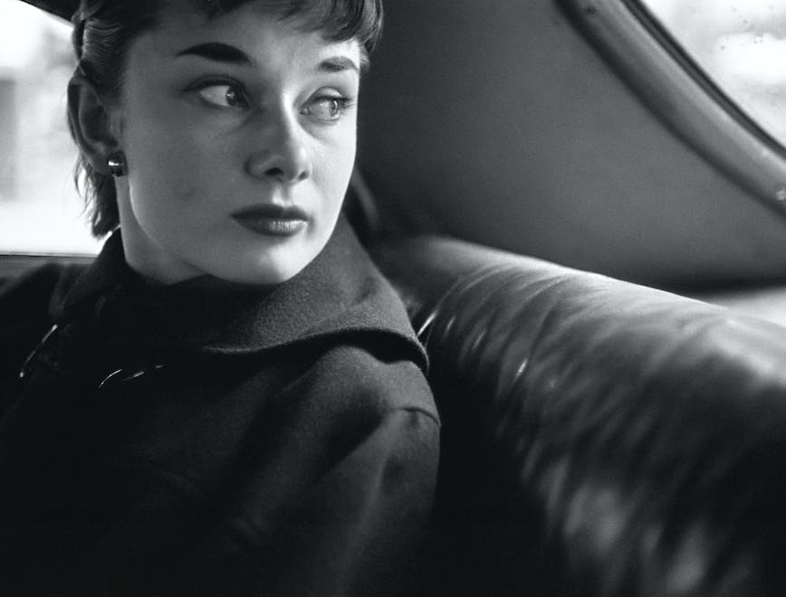 lawrence fried audrey hepburn british actress woman female black and white b/w 1950s fifties 1951 esquire magazine editorial broadway new york horizontal gigi play taxi close-up london human person face cushion photo portrait photography