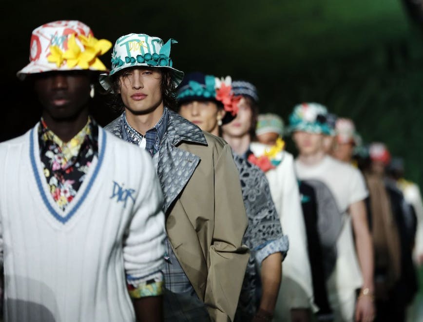 human person clothing apparel hat crowd helmet