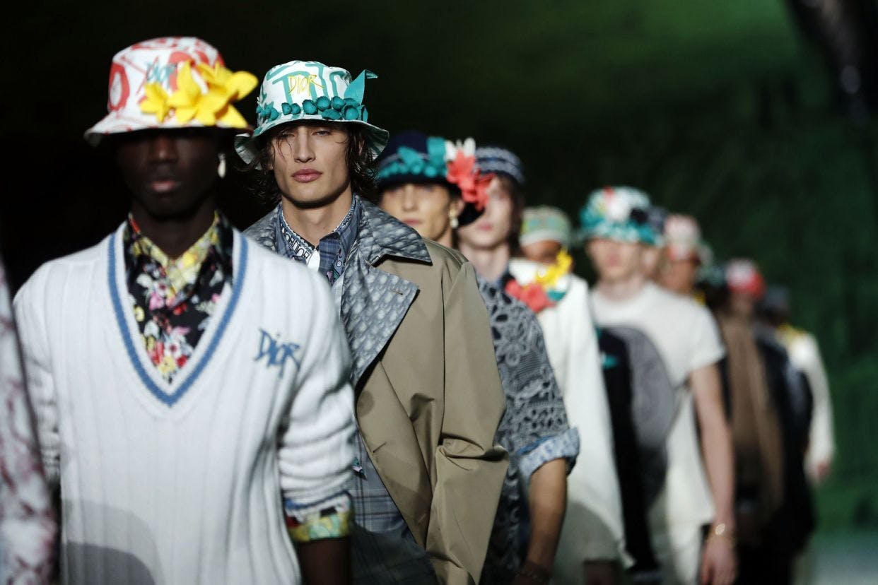 person human apparel clothing hat crowd helmet