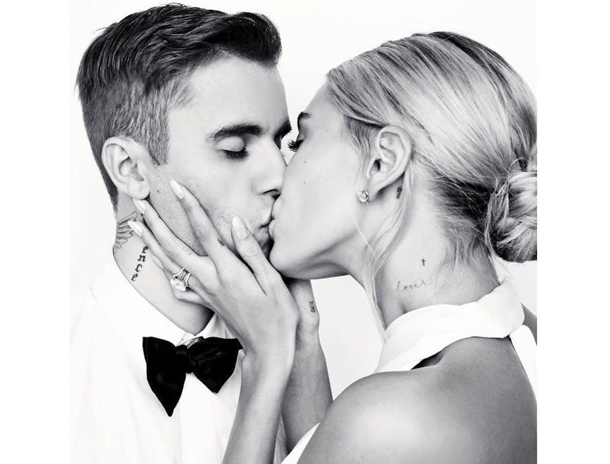 human person apparel clothing kissing kiss bridegroom wedding