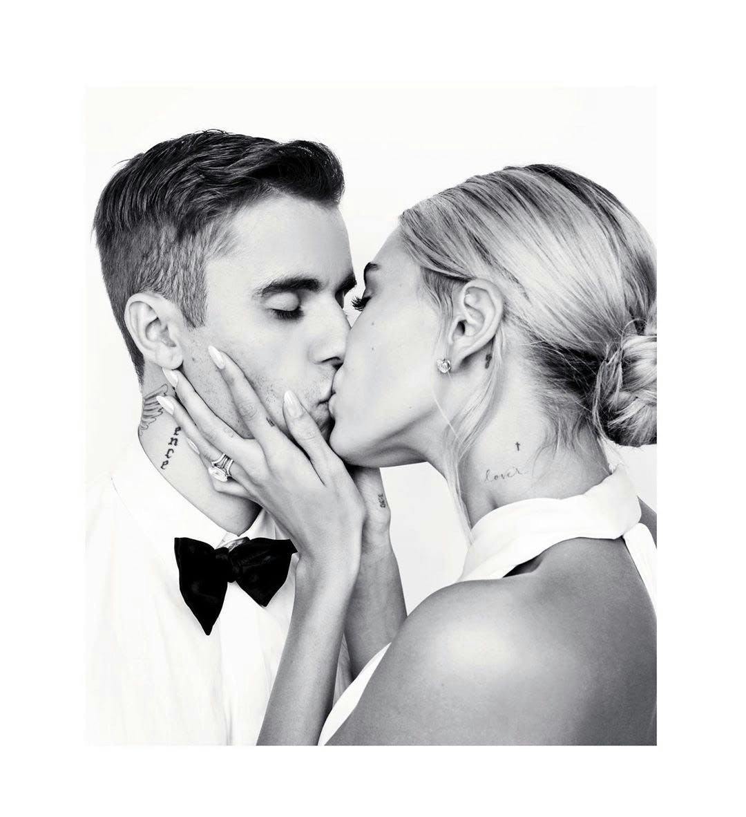 human person clothing apparel kiss kissing bridegroom wedding