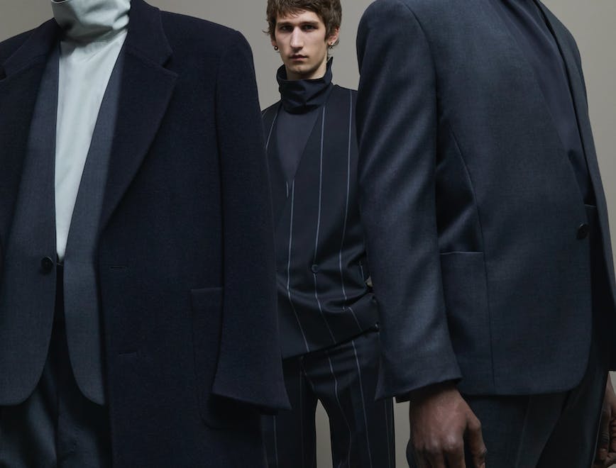 clothing apparel suit overcoat coat human person tuxedo blazer jacket