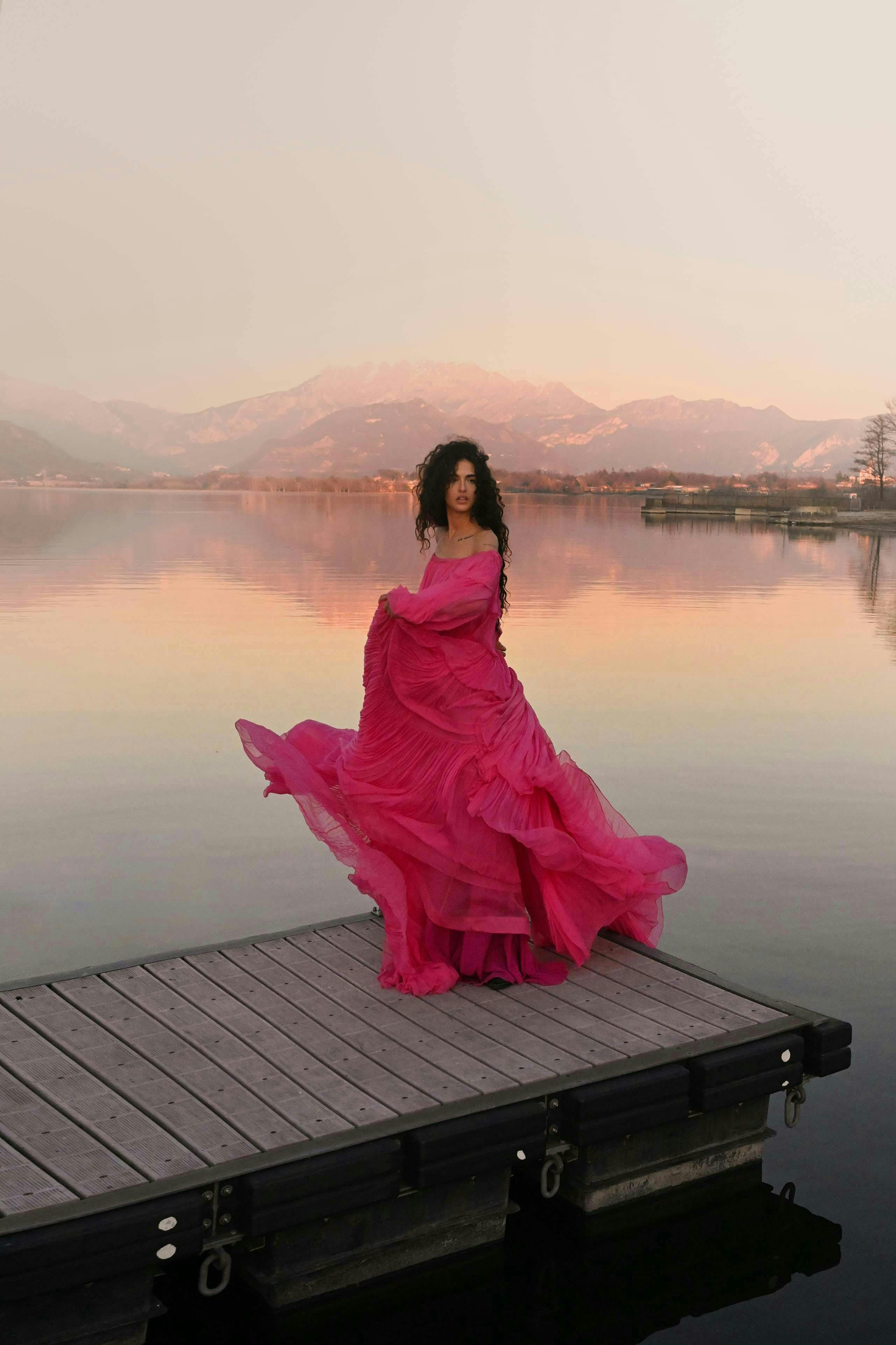 clothing gown robe evening dress fashion water waterfront dance pose person pier