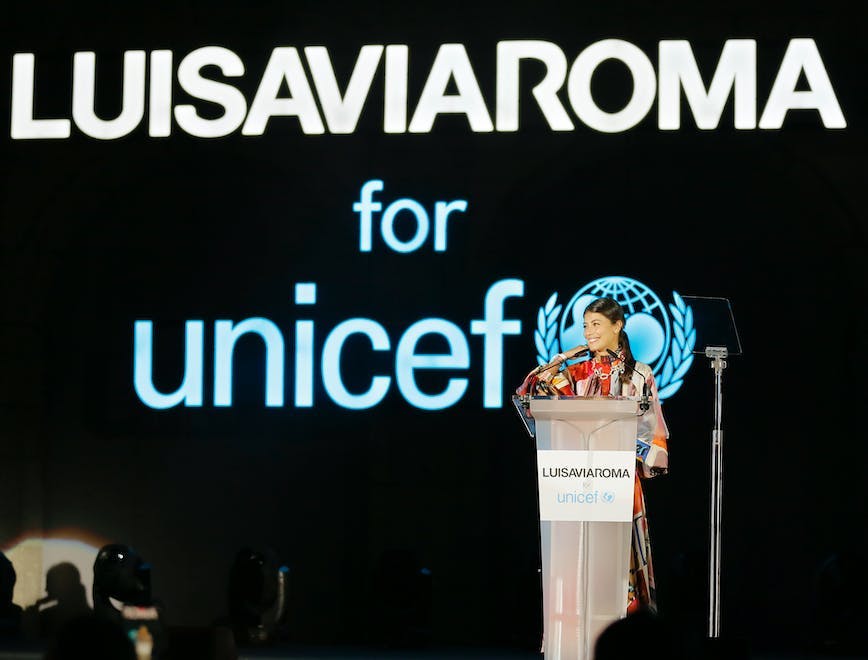 arts culture and entertainment celebrities fashion luisaviaroma dinner event unicef party - social event capri crowd person human audience speech