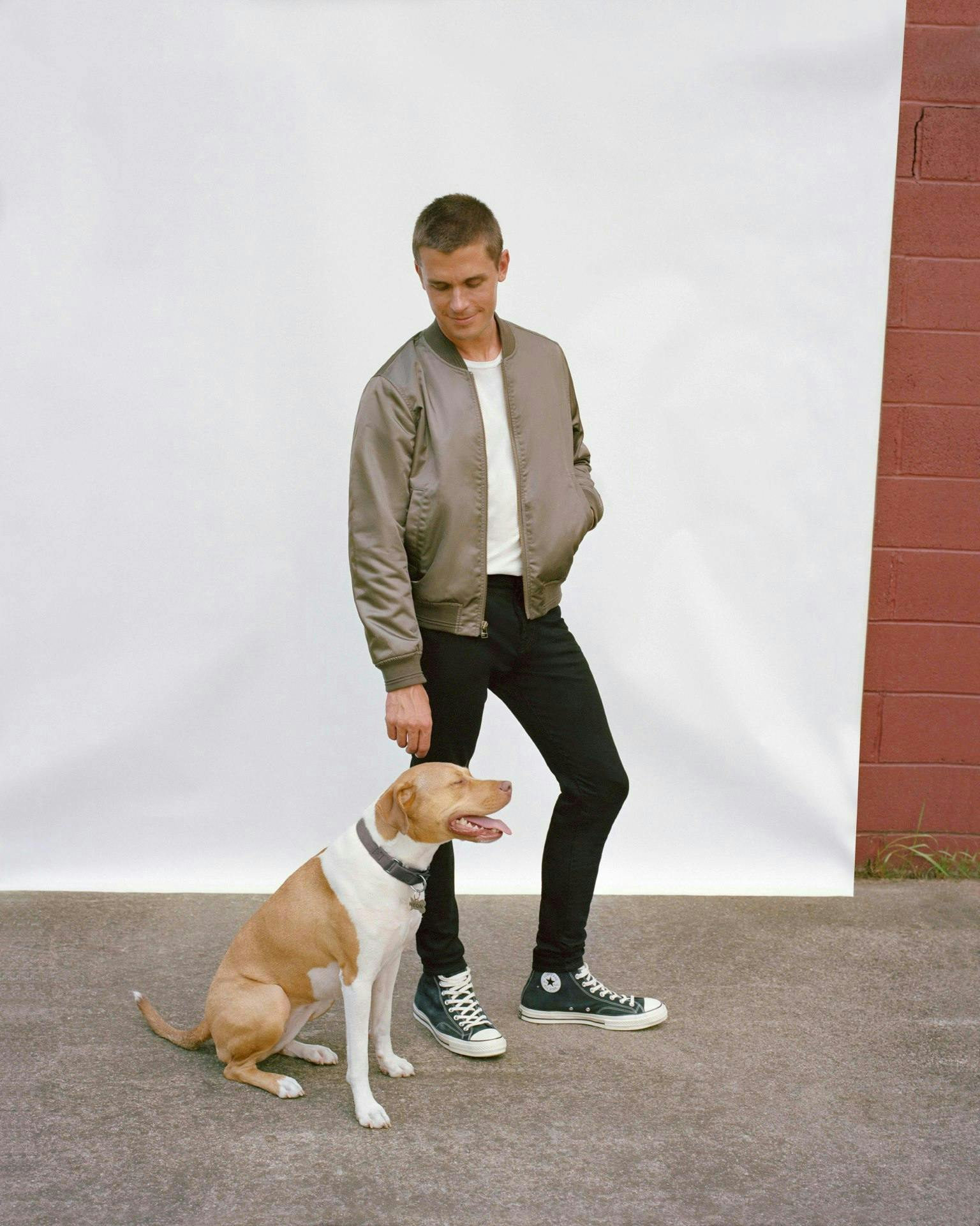person clothing dog mammal canine animal strap footwear shoe sleeve