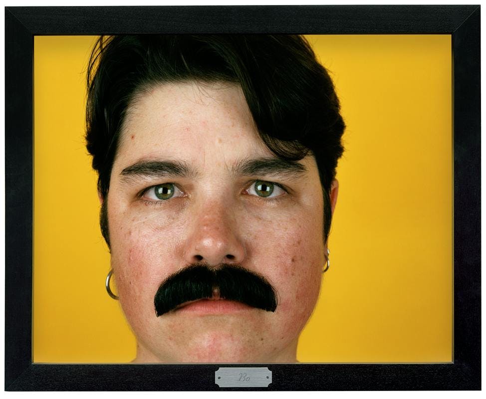 monitor electronics display screen person human mustache