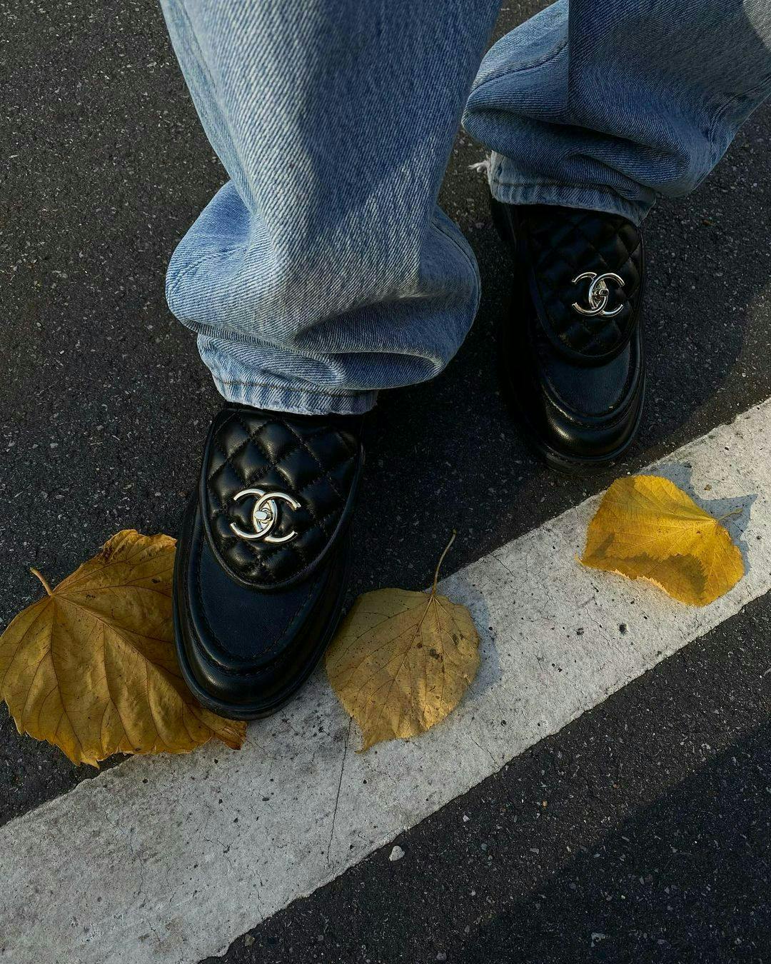 clothing apparel tarmac asphalt shoe footwear person human