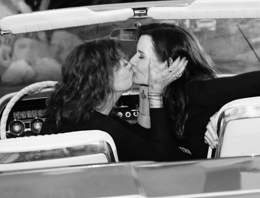 car transportation vehicle automobile person human kissing kiss dating