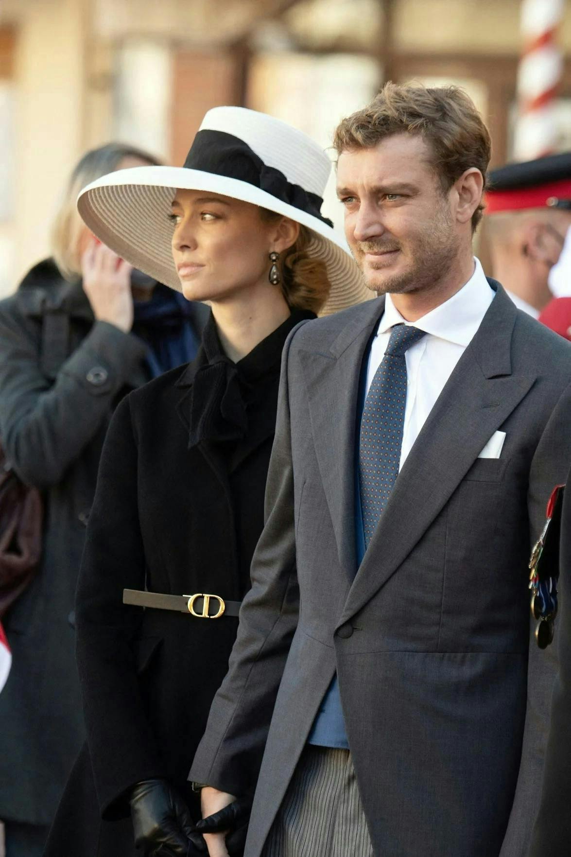 tie accessories accessory hat clothing suit coat overcoat person sun hat