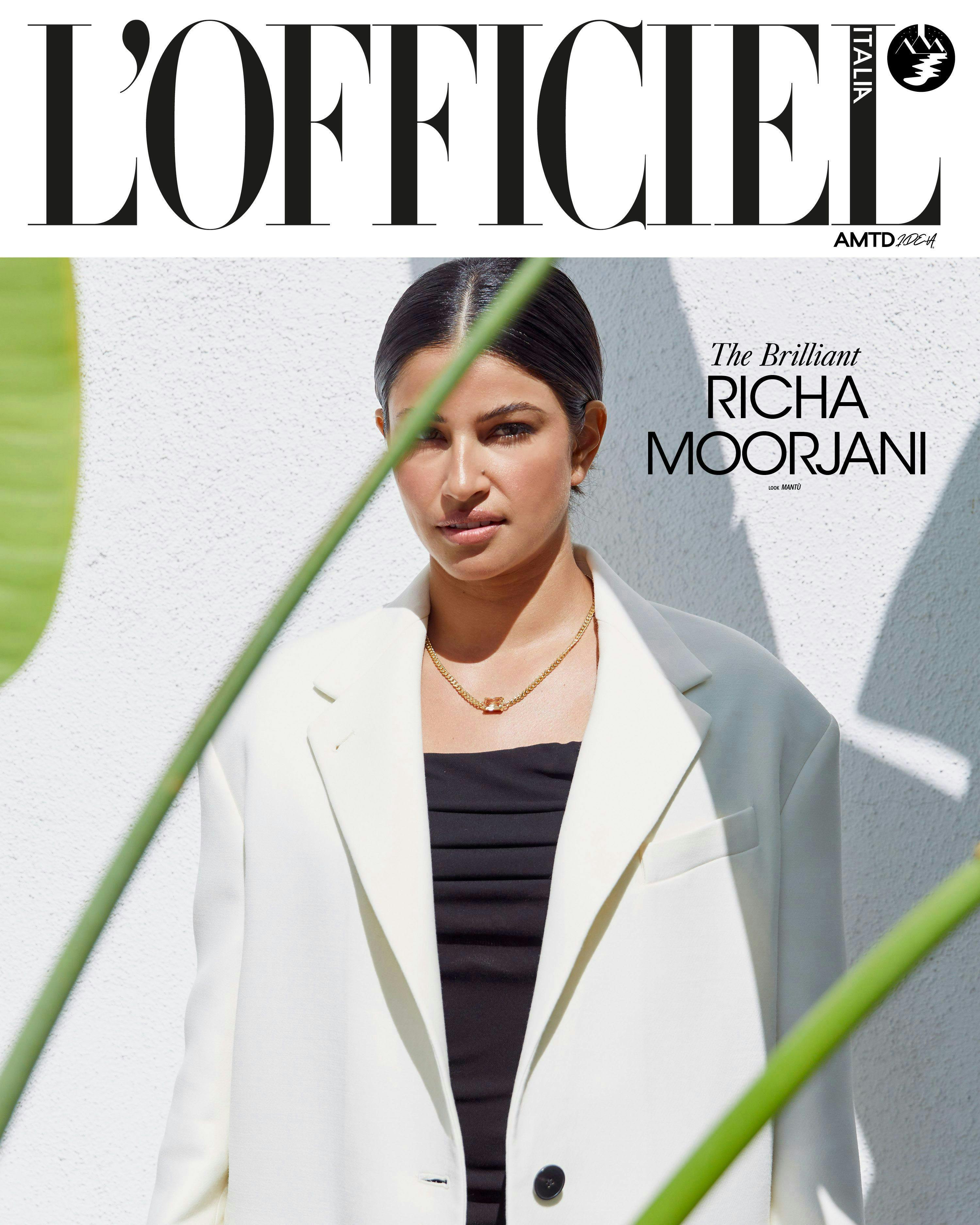 publication coat clothing blazer jacket person woman adult female magazine