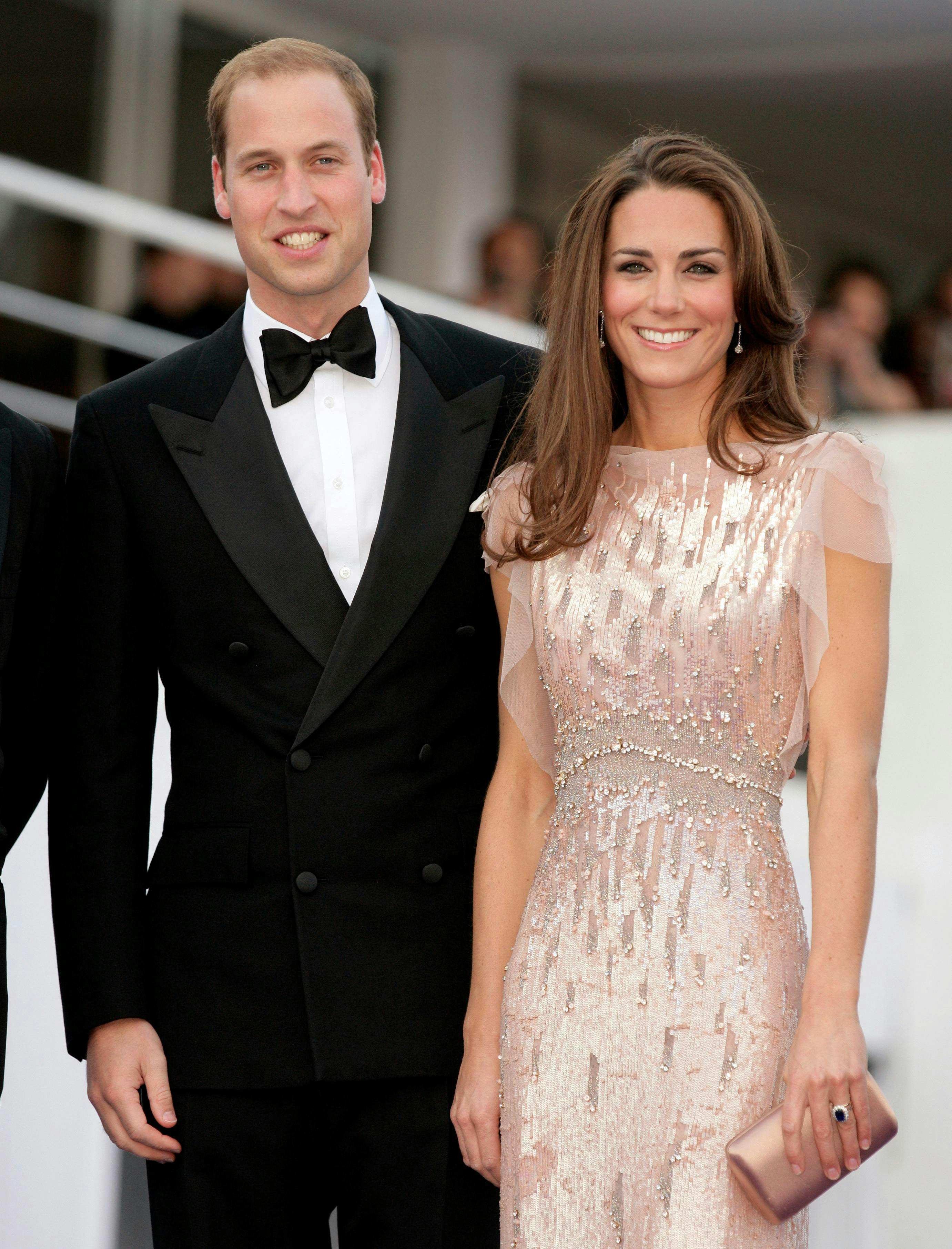 ball gown black tie british royalty catherine middleton celebrities duchess of cambridge duke of cambridge evening wear gown jenny packham kate middleton pink dress prince william royalty sequins smiling two people topics topix bestof toppics toppix london england formal wear fashion dress suit evening dress adult male man person tuxedo