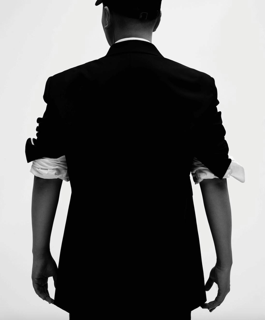 formal wear long sleeve sleeve silhouette suit adult male man person coat