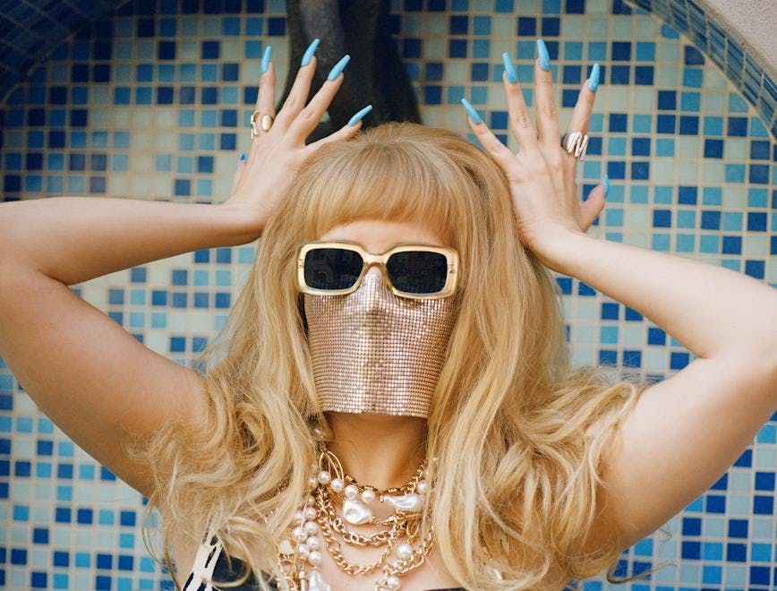 blonde person finger accessories adult female woman head portrait sunglasses