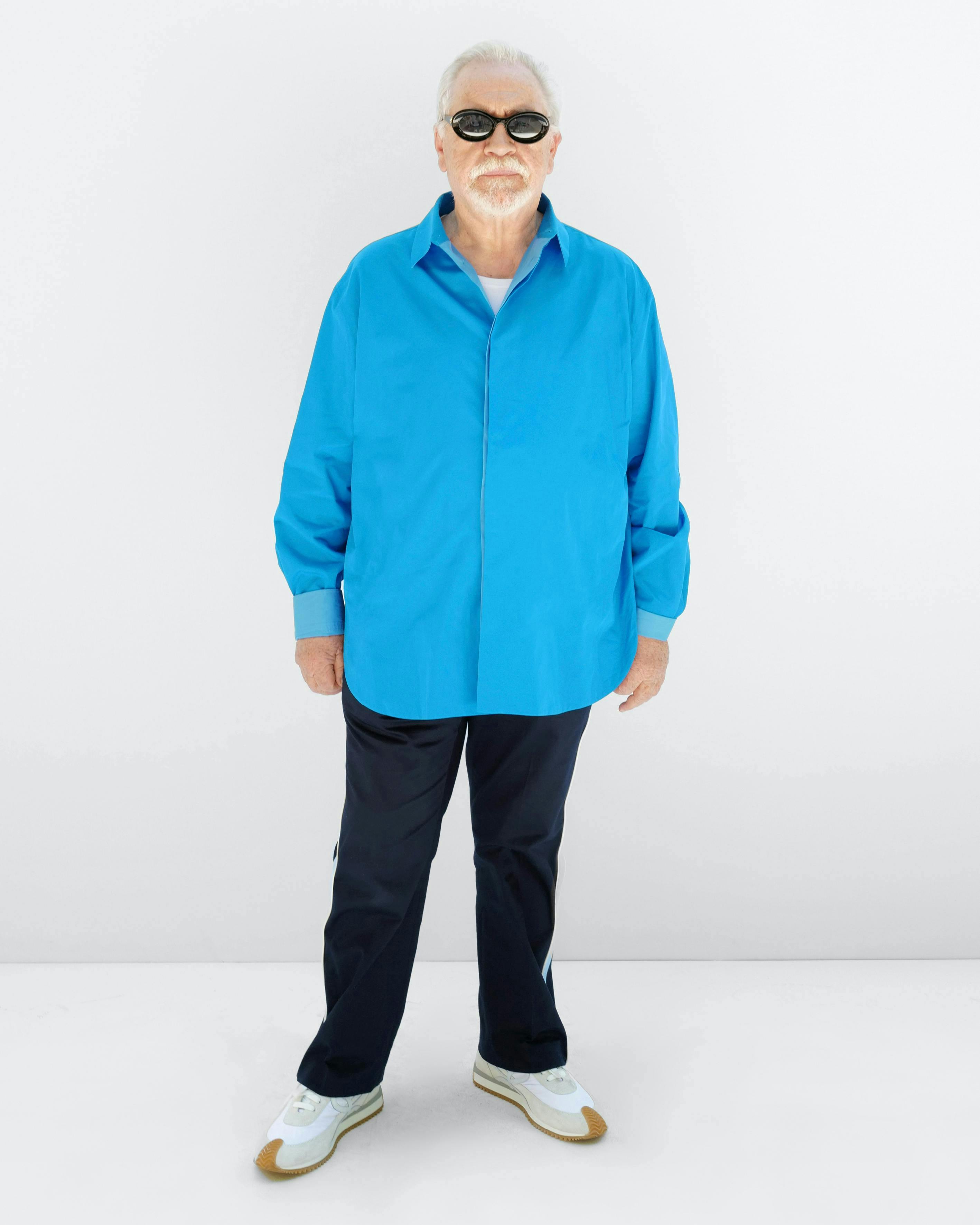 clothing coat lab coat adult male man person long sleeve sleeve glasses