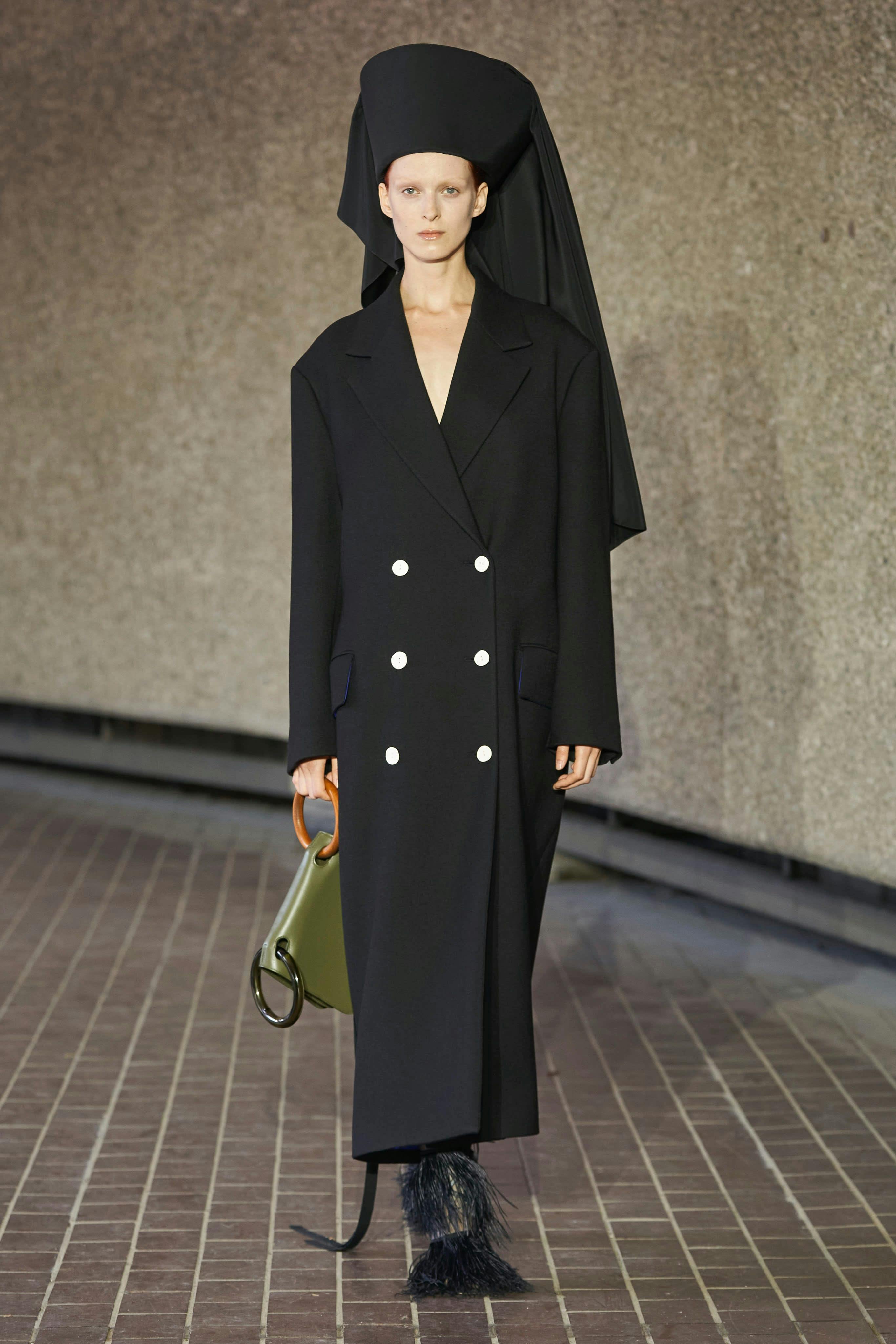 clothing coat overcoat lady person fashion