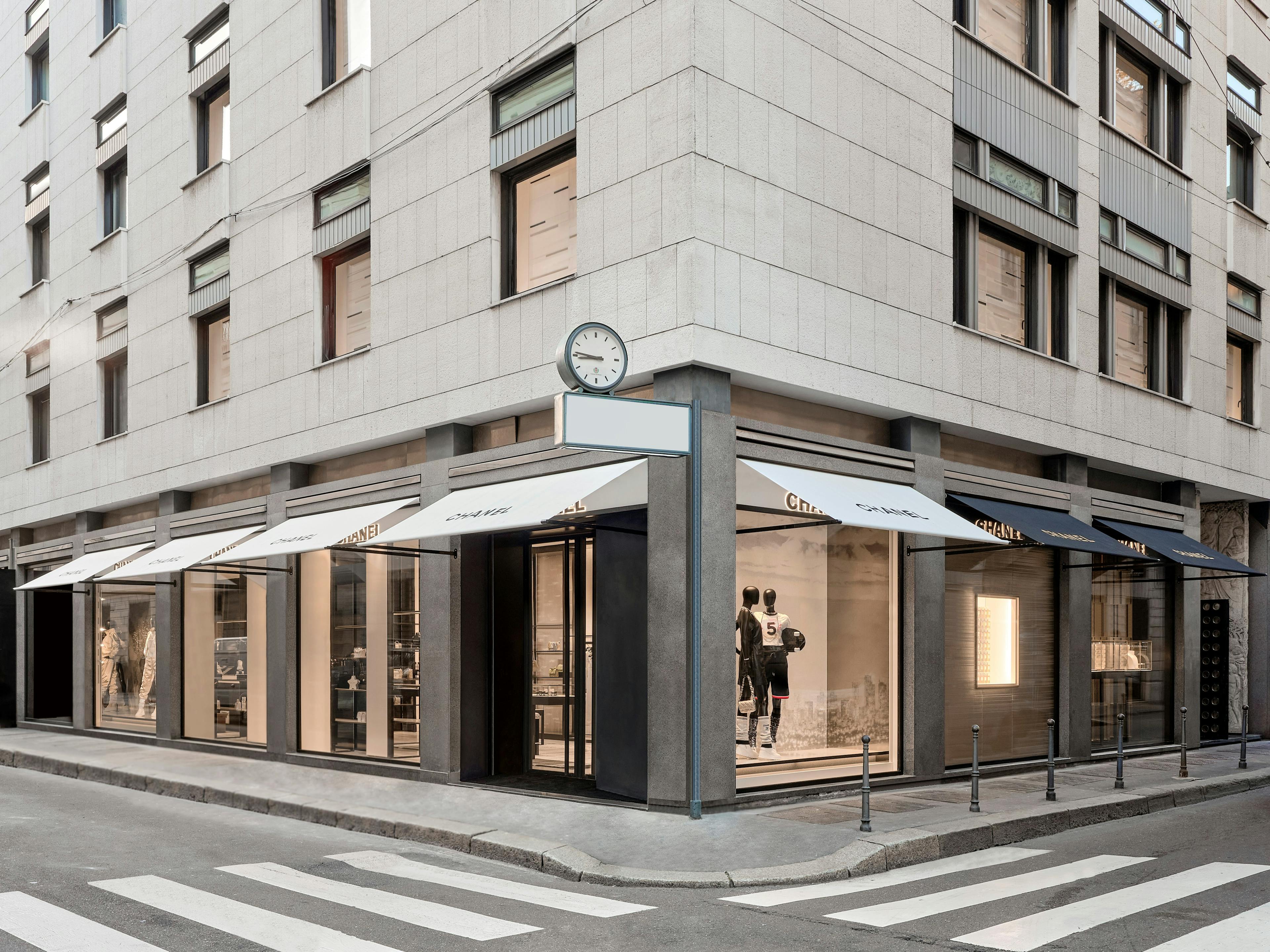 city urban road tarmac street building office building person awning canopy