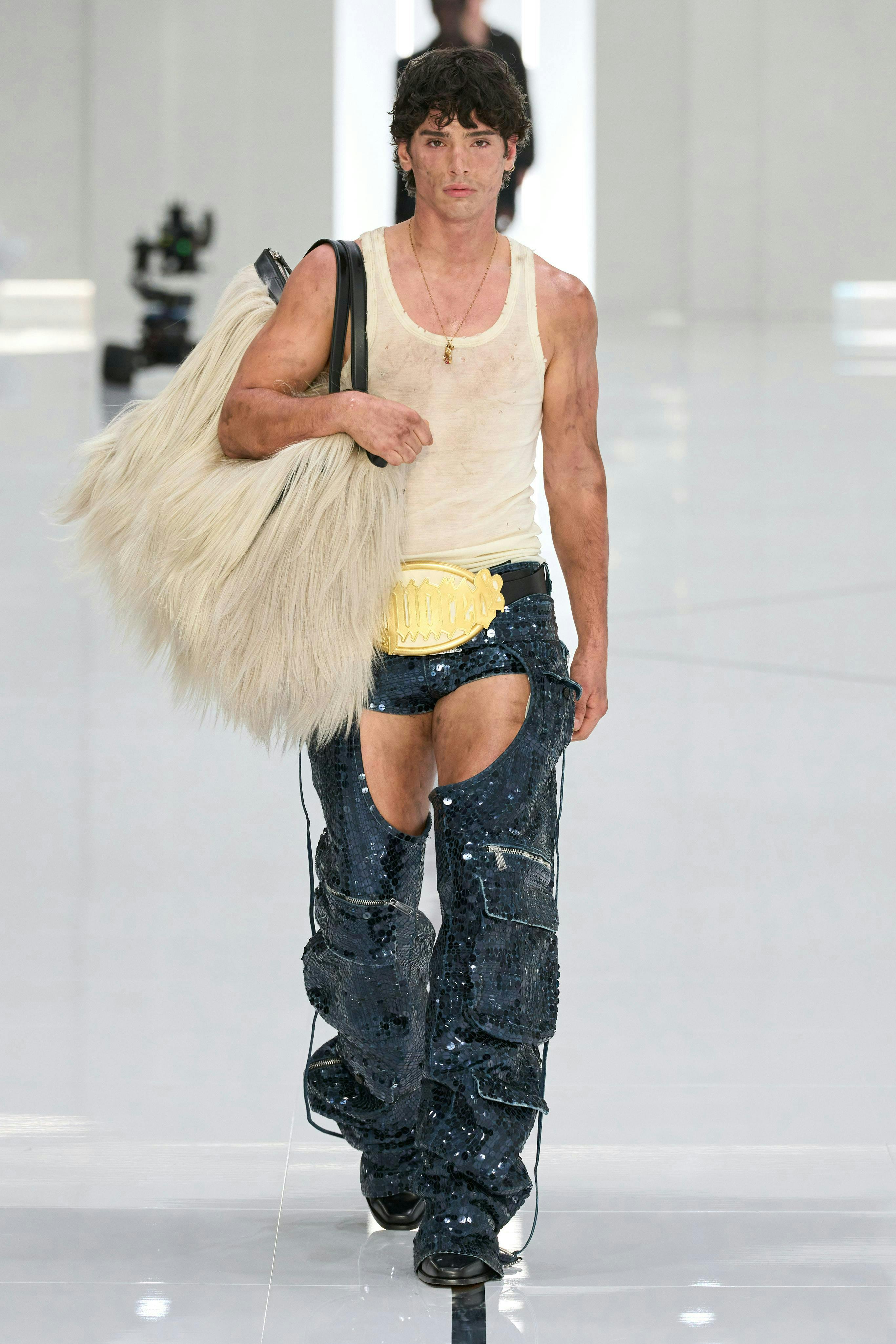 pants fashion handbag necklace adult male man person jeans shoe