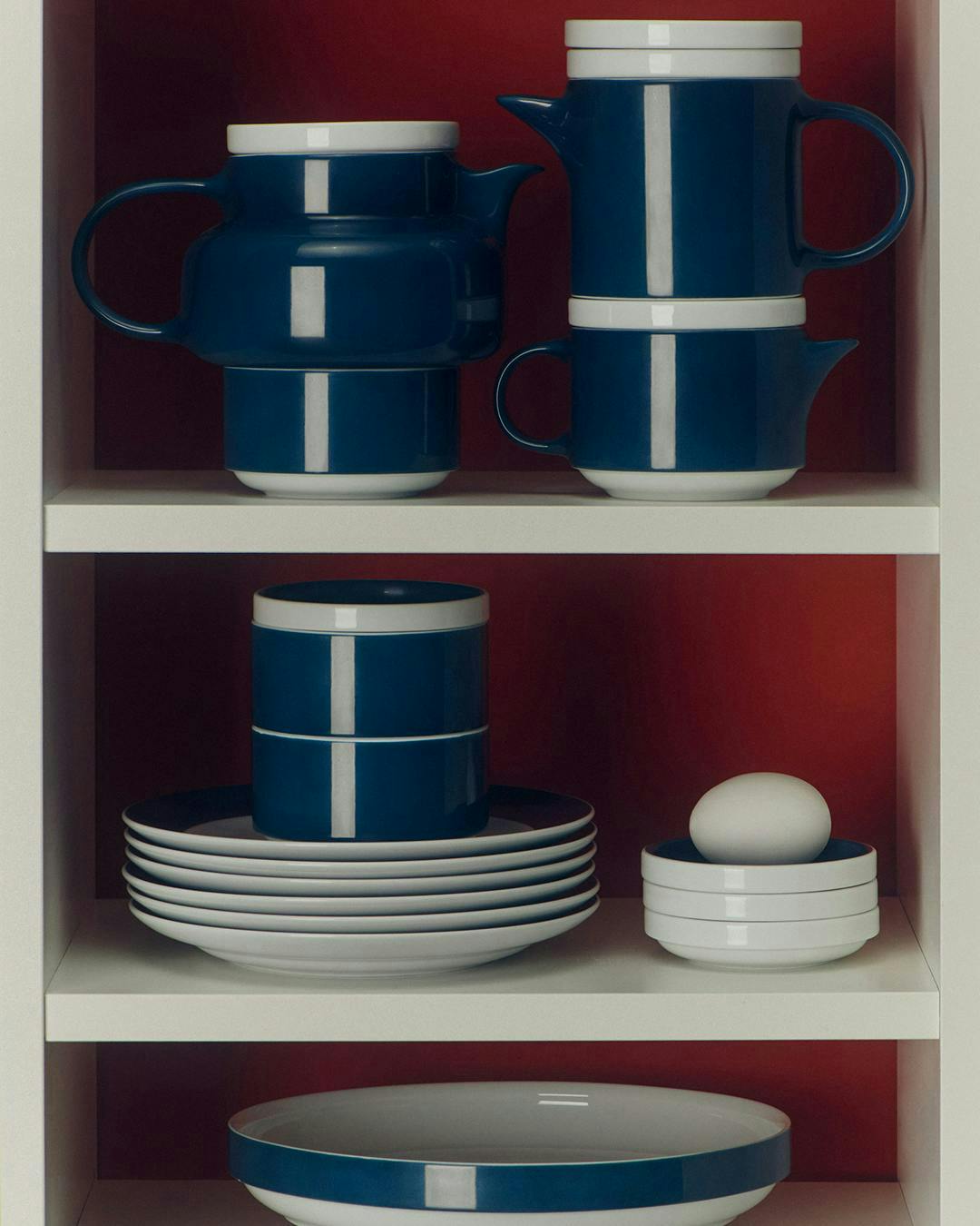 cupboard furniture shelf tape porcelain pottery cup saucer grenade meal